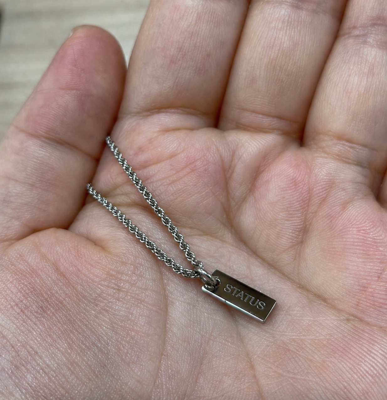 Engraved STATUS Logo Necklace